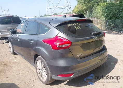 2015 Ford Focus Titanium из США, поврежденный, VIN 1FADP3N24FL254249